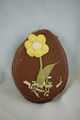 Sweet little flat egg filled with peanut butter crunch. A beautiful hand decorated flower is on the top. Assorted colors.
This product is only available between February 05 and April 07.